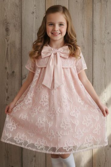 صورة فستان لحمي تل وفينكه منتهيه بالؤلؤ